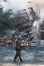 A guard is posted at the site of the World Trade Center attack Wednesday morning Sept. 12, 2001, as emergency personnel continue fighting fires and searching for survivors. (AP Photo/Paul Chiasson)